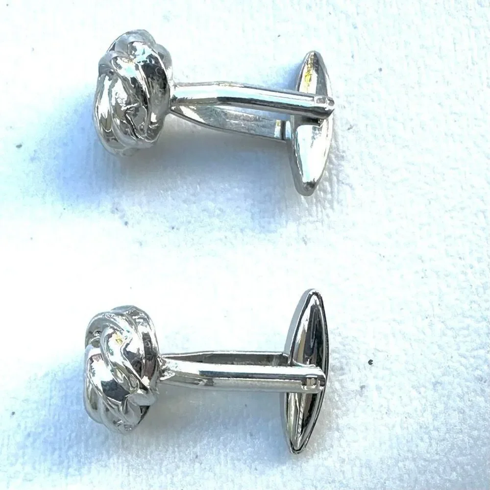 Silver tone knot cuff links